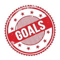 GOALS text written on red grungy round stamp.