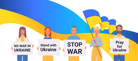 people patriots with Ukrainian flag and banners pray for Ukraine peace save Ukraine from russia stop war concept