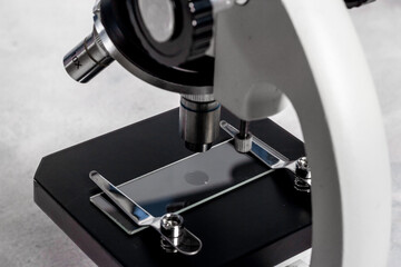 Close up of microscope equipment. Laboratory research concept
