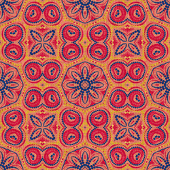Fototapeta premium Indian boho summer bandana seamless symmetrical pattern. Versatile masculine red blue scarf print in kaleidoscopic floral ornamental style.