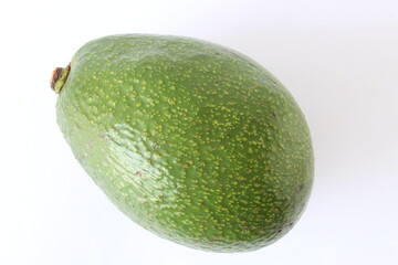 Single avocado isolated on white background, Avocado macro shooting. Top view. 
