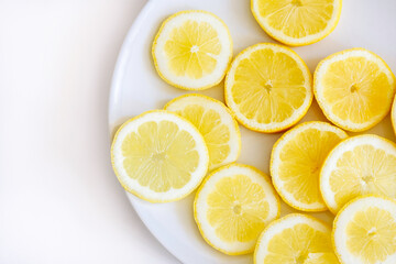 plate with freshly cut lemons