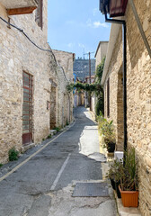 Fototapeta na wymiar Cozy narrow street in an old village of Pano Lefkara. Larnaca, Cyprus