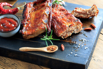 grilled spare ribs on cutting board