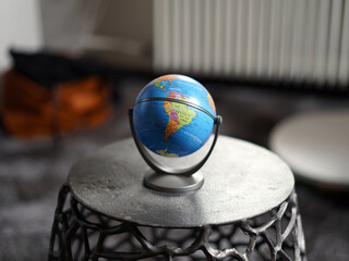 Little globe in the room.
