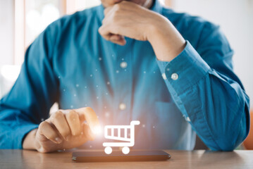Businessman using smartphone with a shopping icon. order in online store, shopping on internet,...