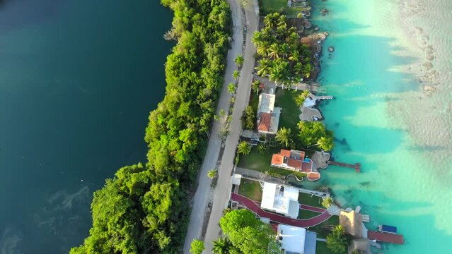 Aerial Drone Shot of Beautiful Cenote Azul and view on 7 seven colors lagoon in Bacalar, Quintana Roo, Mexico