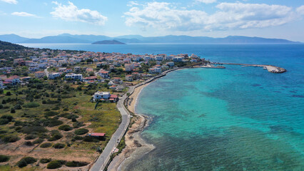 Aerial drone photo of small picturesque village beach and port of Megalochori in island of Agistri, Saronic gulf, Greece