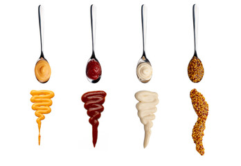 Mustard, mayonnaise, ketchup, chili sauce in a spoon. Sauce in spoon and sauce line isolated on white background.
