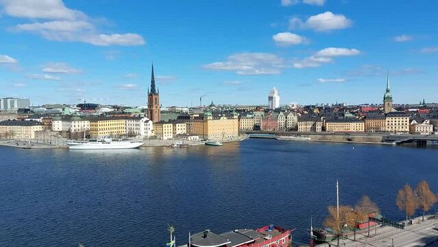 Stockholm, Sweden - April 27, 2022: Overlooking the of famous Stockholm skyline including Stockholm city center and the historic Riddarholmen in Gamla Stan old town district.