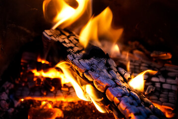Closeup shot of wood burning in the fireplace