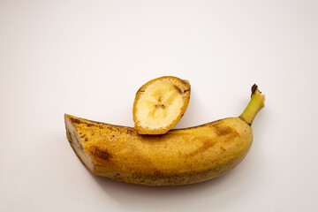 Spoiled banana on a white background