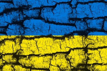 Ukraine national blue-yellow flag on a texture of dry