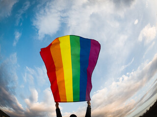gay flag against blue sky lgbt and pride