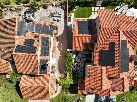Aerial top view of residential villas with solar panel on the roof, San Diego, California, USA. April 13th, 2022