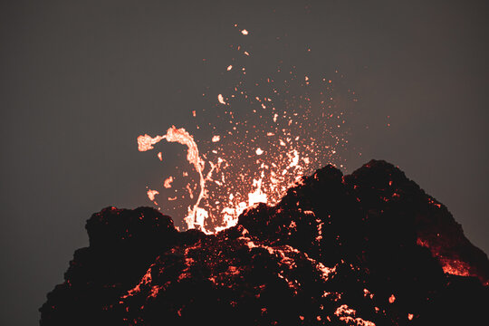 Close-up of the famous Icelandic volcano with lava inside the crater
