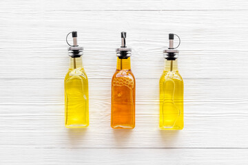Bottles of different types cooking oil. Sunflower olive and sesame oil