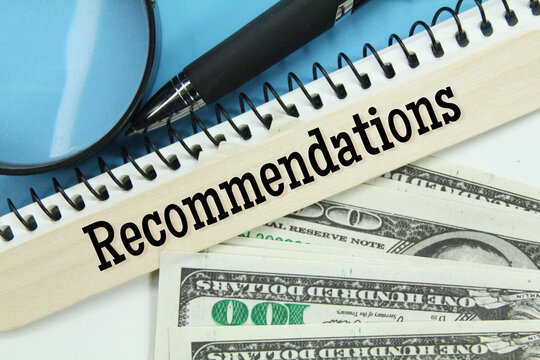 banknotes, pens, magnifying glasses with word recommendations