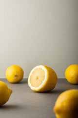 Fresh raw lemons on color  background. High resolution image