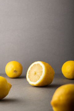 Fresh raw lemons on color  background. High resolution image