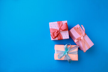  Gift boxes  on color background. Happy womens day. Happy Mothers day.Hello Spring- Image