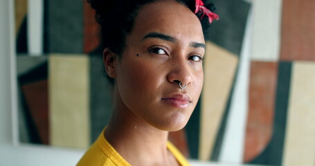 Mixed race girl turning head to camera