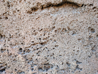 Texture of a stone wall. Old antique stone wall texture background