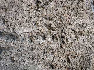Texture of a stone wall. Old antique stone wall texture background