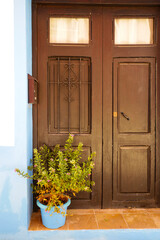 Brown wooden door in Finestrat village