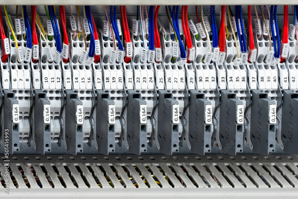 Poster color wires in a box of distribution of an electricity, plc control panel with wiring, lectric contr