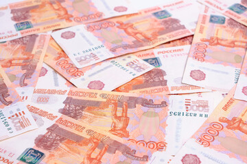 Background, Russian rubles banknotes in denominations five thousand rubles.