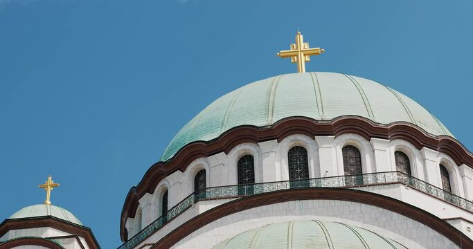 an Orthodox church with a large dome and a large golden cross