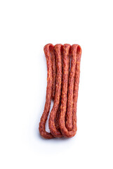 Dry cured Kabanos sausage isolated on white