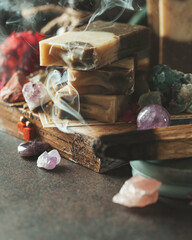 Palo Santo, holy sacred tree stick, burning with aroma smoke. Healthy lifestyle. Esoteric life balance, good energy concept. Healing energy with crystals and smoke.