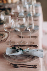 shining glasses in the wedding festive table setting side view