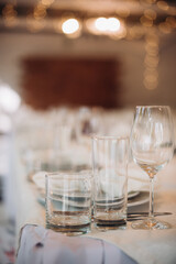 shining glasses in the wedding festive table setting side view