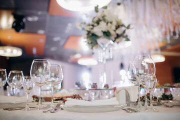 shining glasses in the wedding festive table setting side view