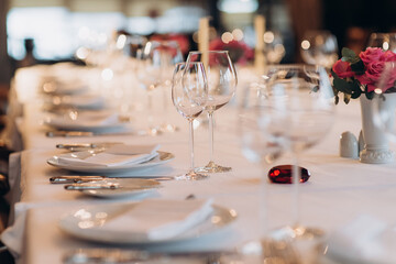 shining glasses in the wedding festive table setting side view