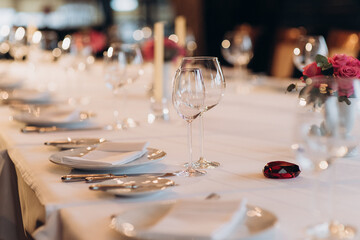 shining glasses in the wedding festive table setting side view