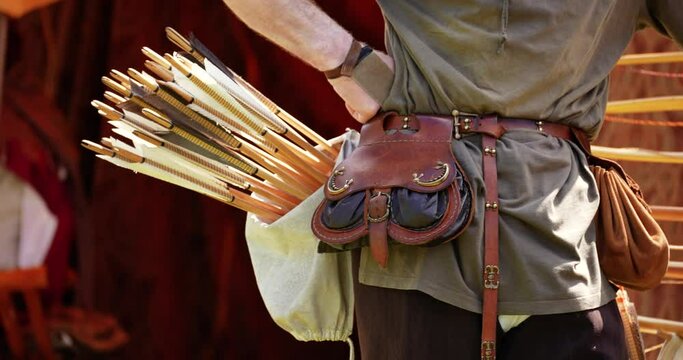 medieval equipment of a soldier with arrows on him