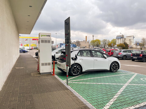 Poland, Poznan - 23 April 2022 Greenway Polska plug-in electric cars charging station on a parking lot. Alternative energy for transportation 