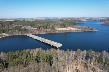 abandoned and unfinished highway bridges ending in the middle of a floded dam.Mosty protektorátní dálnice. Czech republic, Europe panorama view