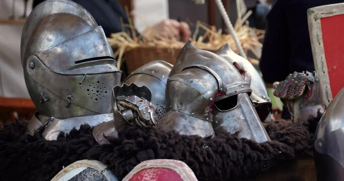 medieval war equipment made of metal armor and shields