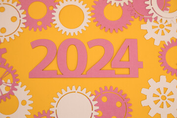 Year 2024 on the background of paper gears