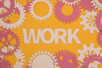 Paper inscription on the background of paper gears