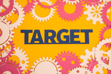 Paper inscription on the background of paper gears