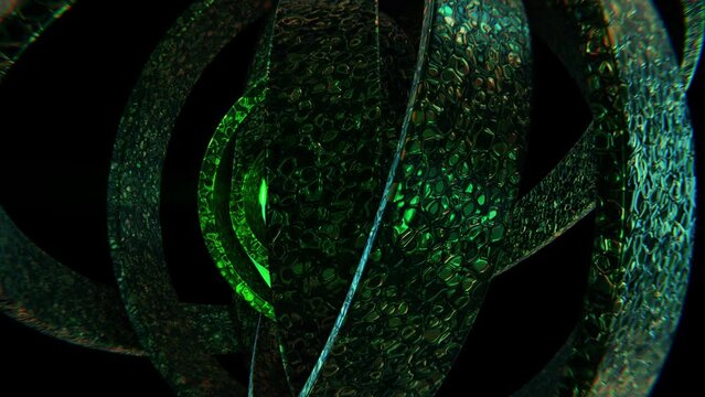 Realistic looping abstract 3D animation of the reptile skin textured green metallic rings rotating around the green shining reactor core rendered in UHD as motion background