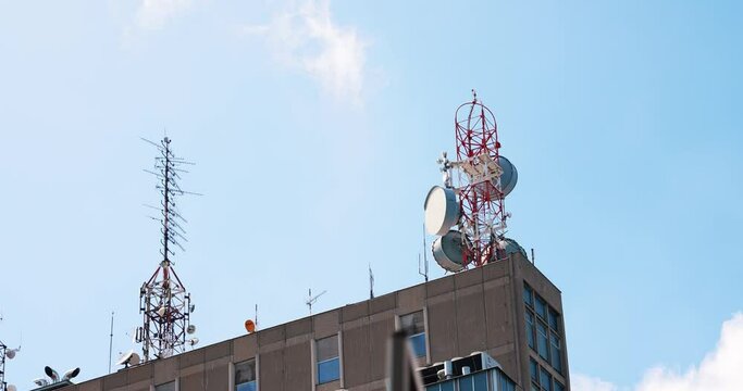 radio and signal antennas on the roof of the building together with repeaters