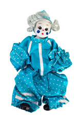 Little porcelain clown in blue dotted overalls, isolated.