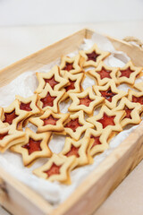 Star shaped linzer cookie strawberry jam